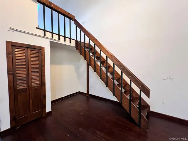 a view of entryway with wooden floor