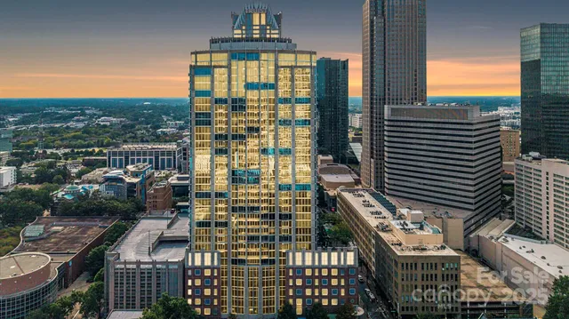 a view of a city with tall buildings