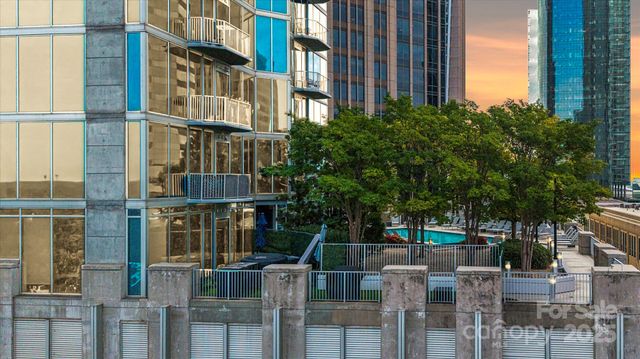 a view of a building with a street