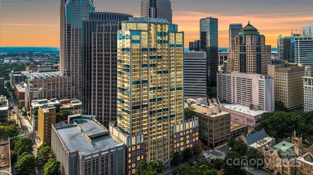 a view of a city with tall buildings