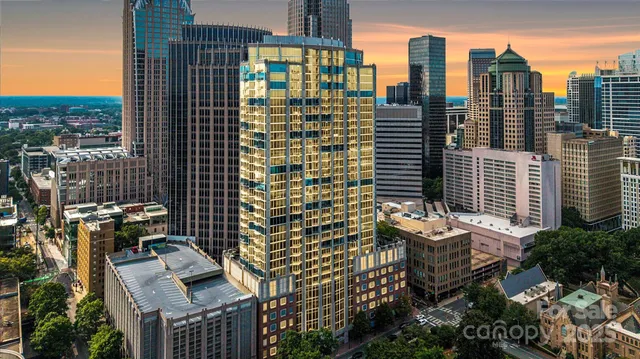 a view of a city with tall buildings