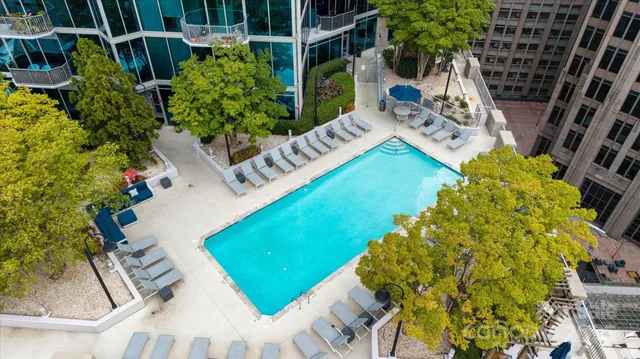 a view of an chairs and table in the patio