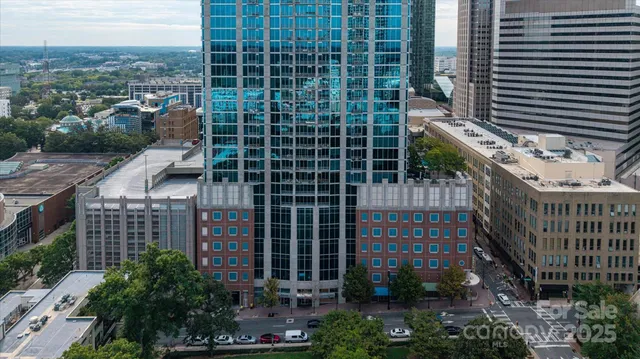 a view of a building with garden and plants