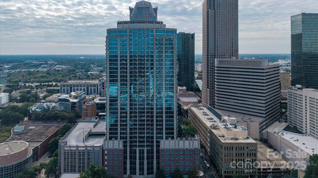 a view of a city with tall buildings