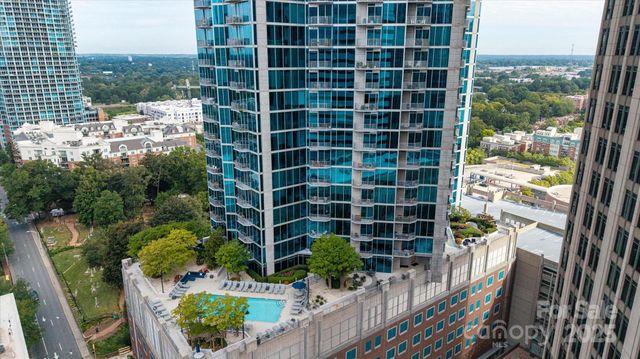 a view of balcony with potted plants