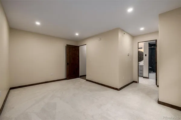 a bathroom with a mirror a sink and vanity