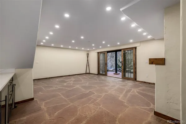 an empty room with windows
