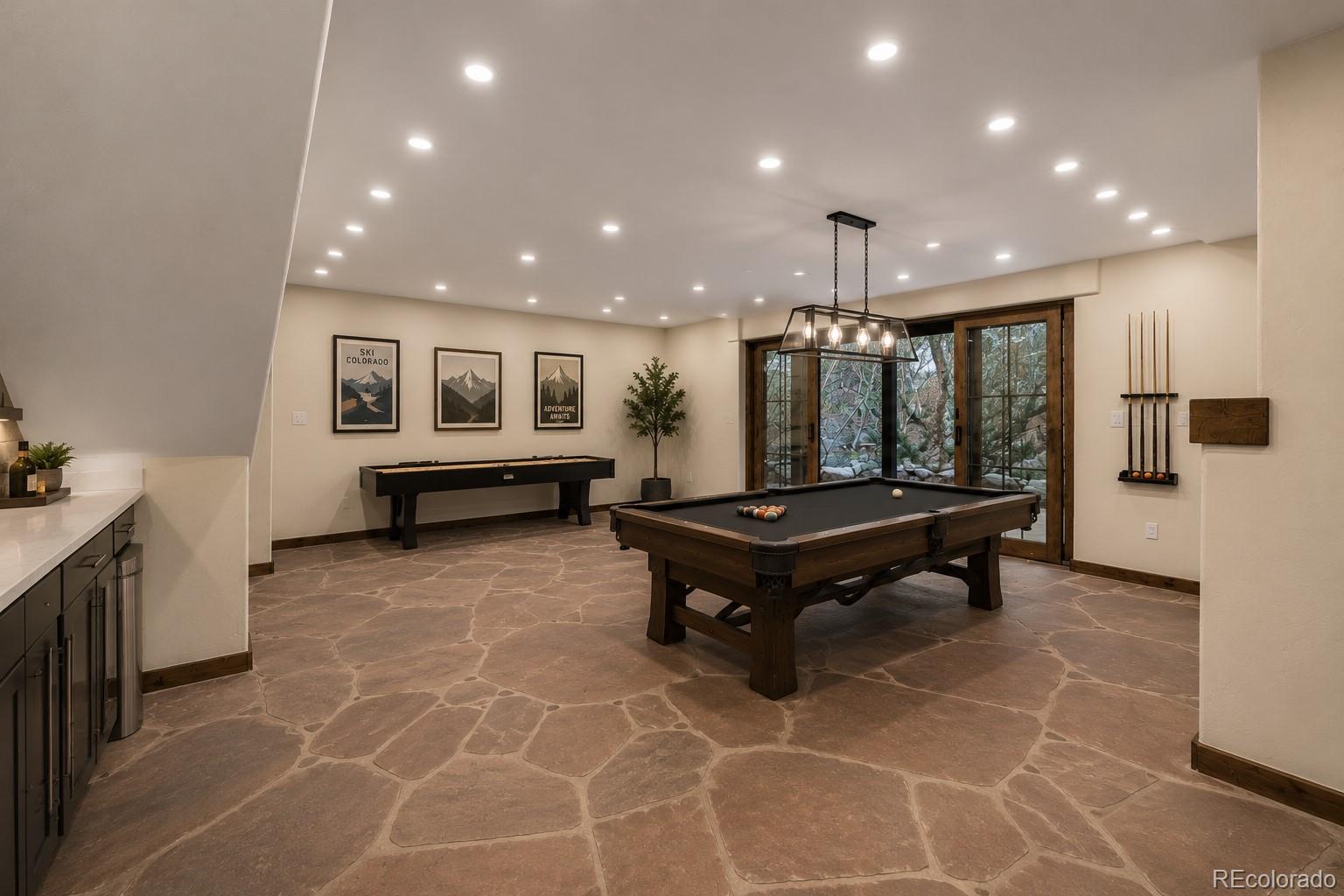 205 Loop Drive Georgetown, CO 80444 - Photo 42 of 49 a room with pool table and windows
