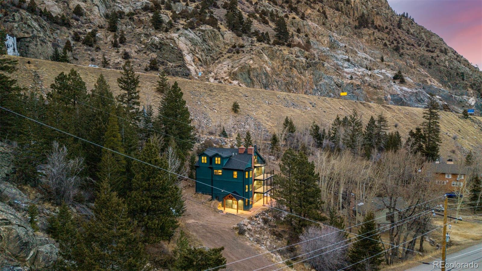 205 Loop Drive Georgetown, CO 80444 - Photo 46 of 49 a view of a city with lush green forest
