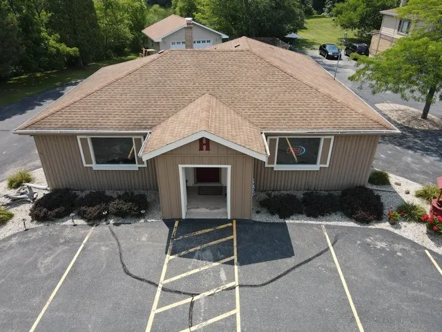a house with trees in the background