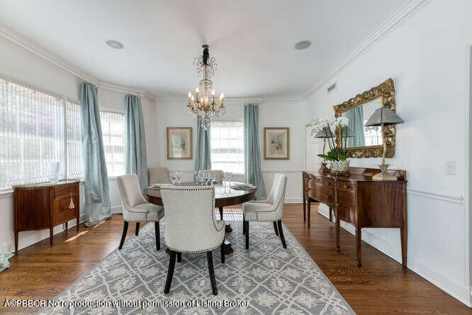 229 Pendleton Avenue Palm Beach, FL 33480 - Photo 14 of 36 a view of a dining room with furniture