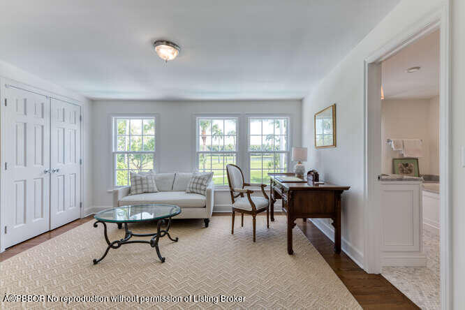 229 Pendleton Avenue Palm Beach, FL 33480 - Photo 23 of 36 a living room with furniture and a window