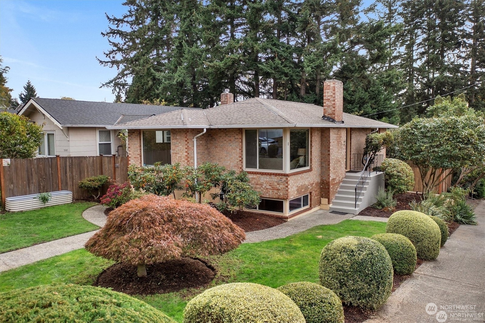 3801 Northeast 75th Street Seattle, WA 98115 - Photo 1 of 40 a front view of house with yard and green space