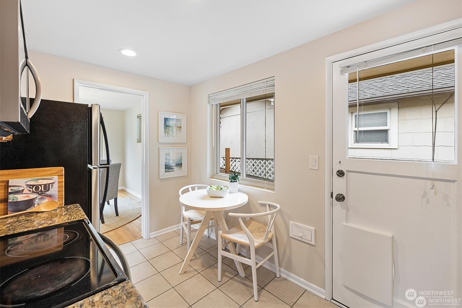 3801 Northeast 75th Street Seattle, WA 98115 - Photo 13 of 40 a view of a dining room with furniture