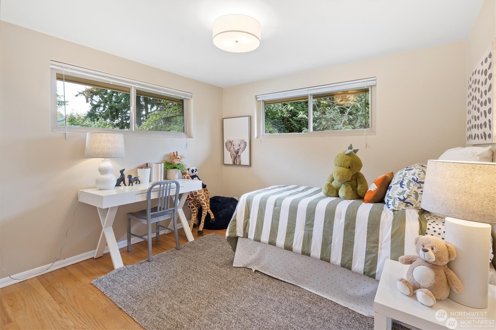 3801 Northeast 75th Street Seattle, WA 98115 - Photo 15 of 40 a living room with a couch and a table