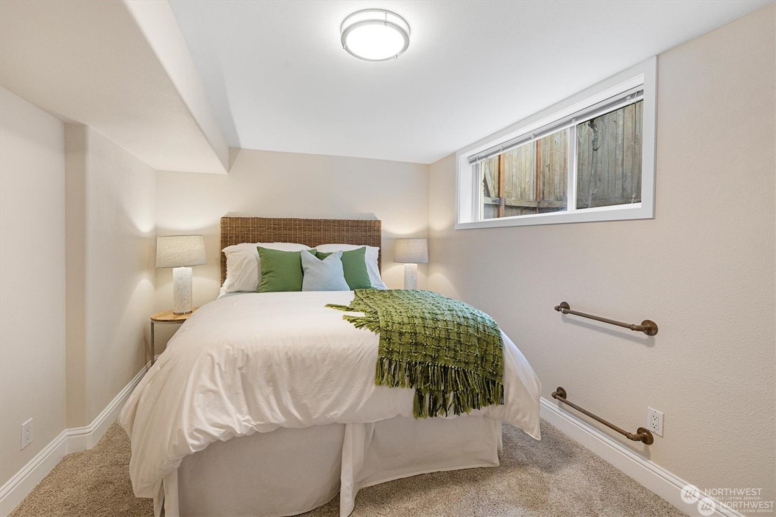 3801 Northeast 75th Street Seattle, WA 98115 - Photo 21 of 40 a bedroom with a bed and painting on the wall