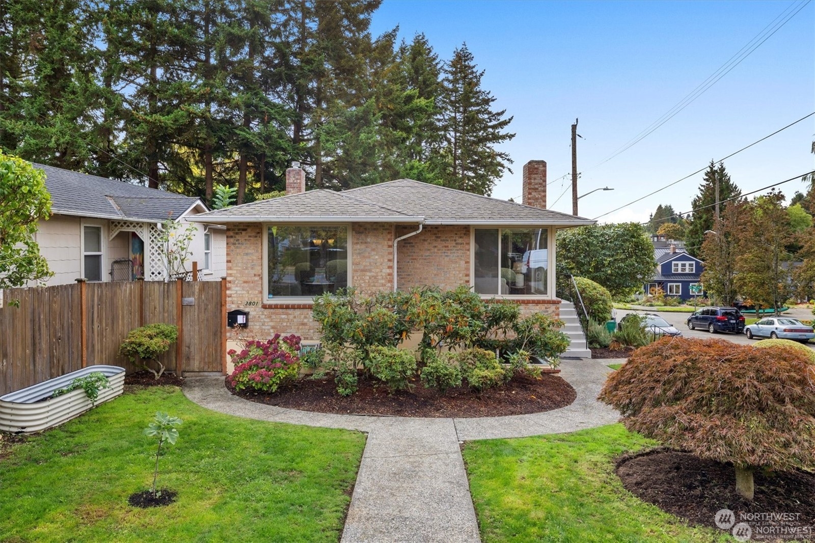3801 Northeast 75th Street Seattle, WA 98115 - Photo 30 of 40 a front view of a house with garden