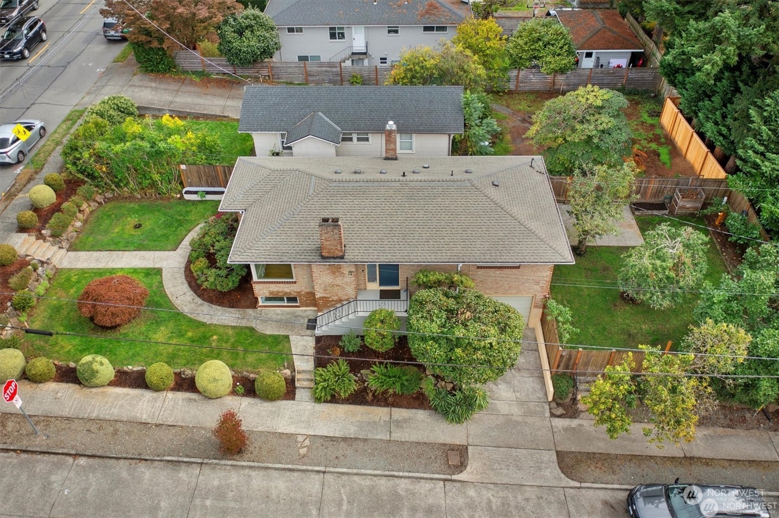 3801 Northeast 75th Street Seattle, WA 98115 - Photo 31 of 40 an aerial view of a house with a yard and potted plants