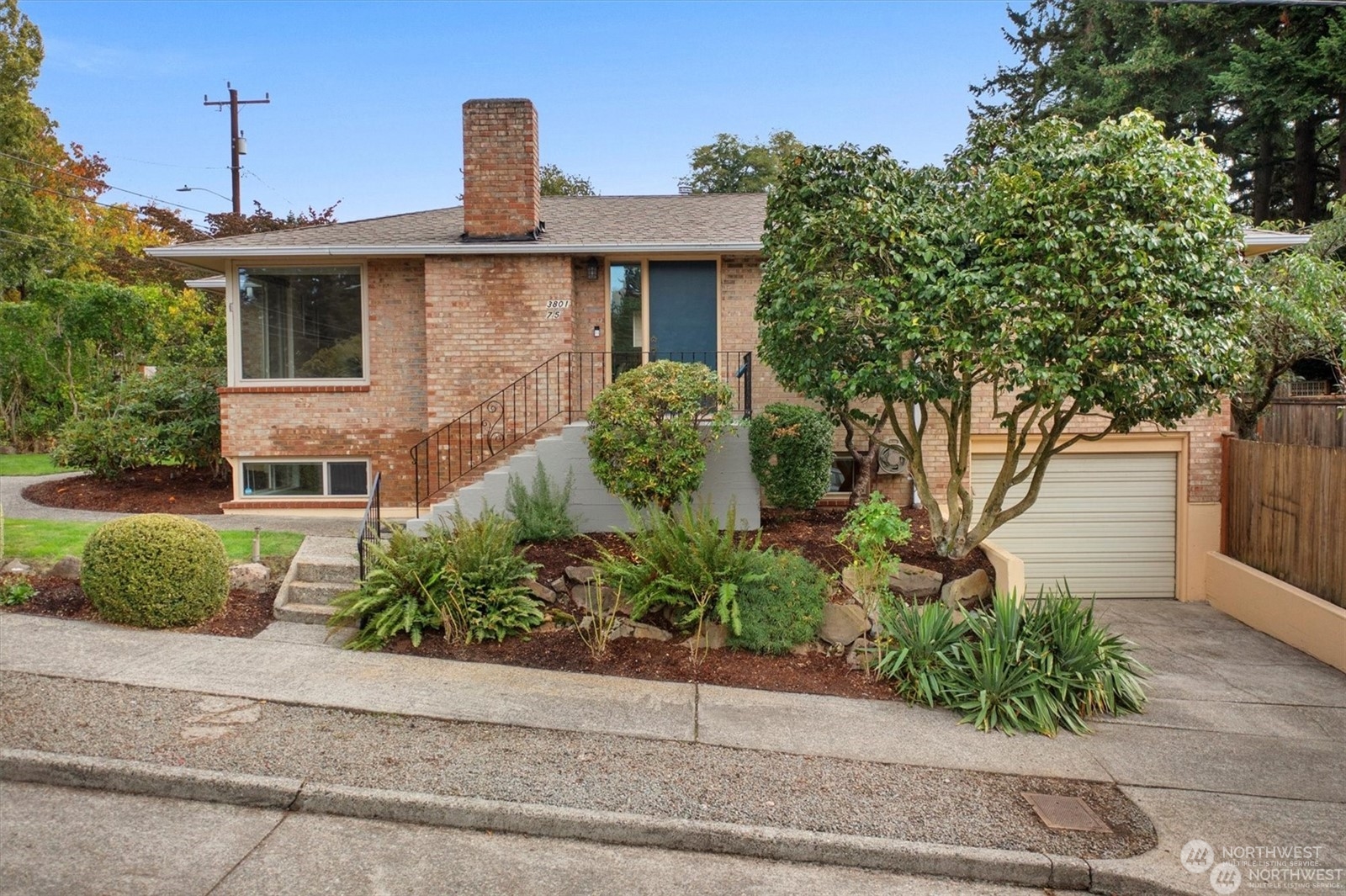 3801 Northeast 75th Street Seattle, WA 98115 - Photo 33 of 40 a front view of a house with a yard