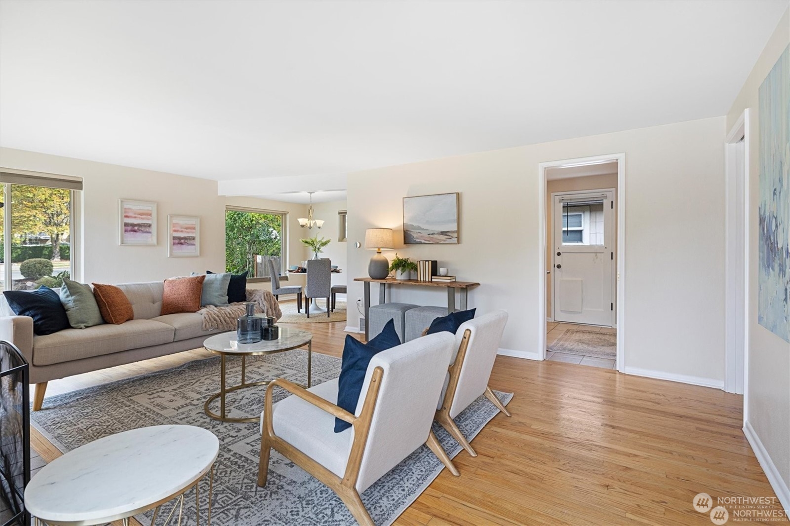 3801 Northeast 75th Street Seattle, WA 98115 - Photo 5 of 40 a living room with furniture and a wooden floor