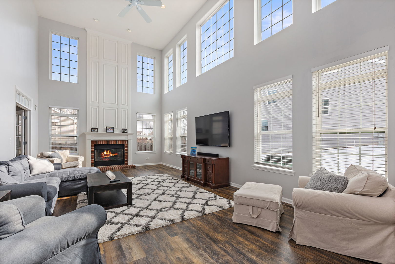 32205 Rockwell Drive McHenry, IL 60051 - Photo 13 of 27 a living room with furniture fireplace and a large window
