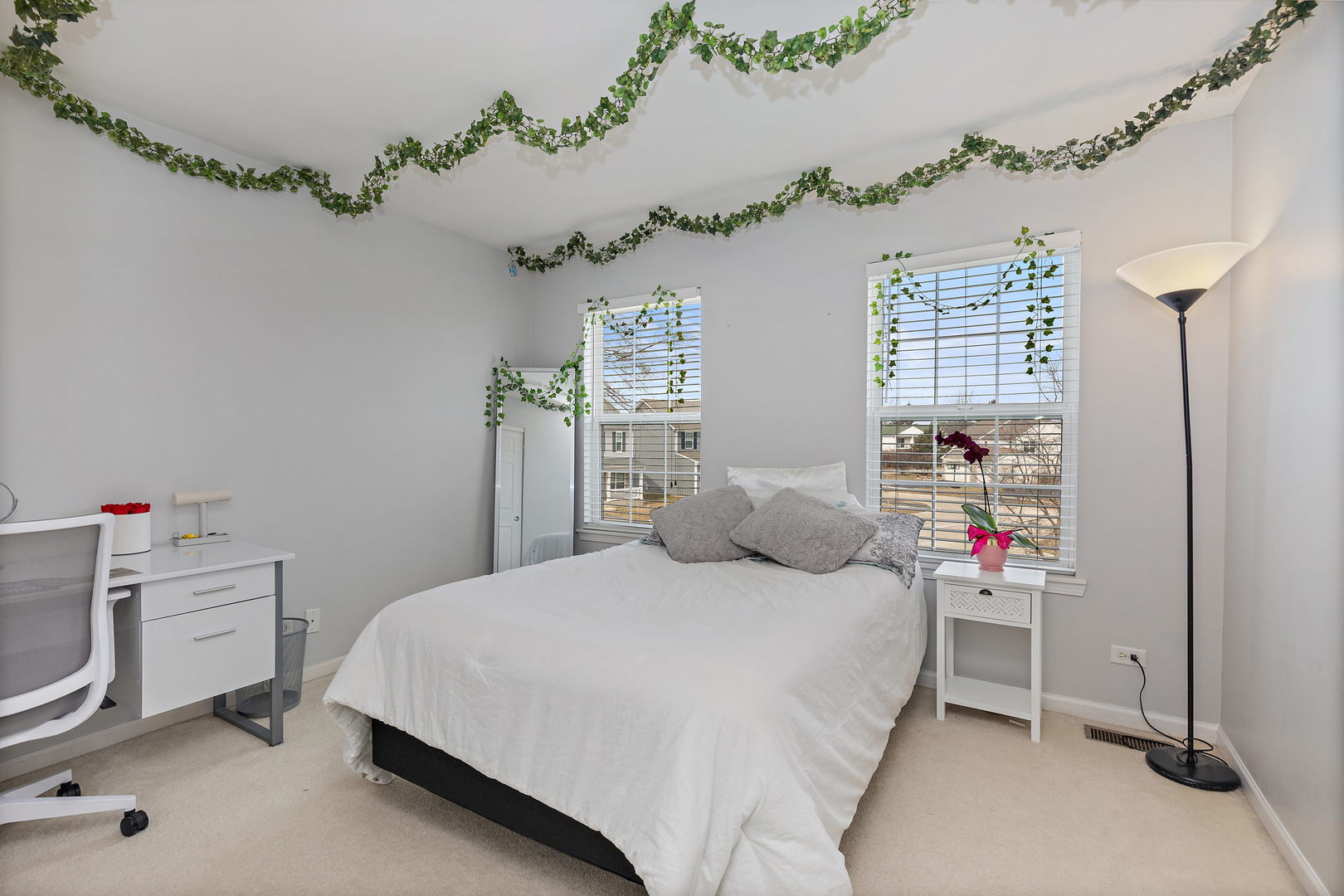 32205 Rockwell Drive McHenry, IL 60051 - Photo 21 of 27 a bedroom with a bed dresser and a window