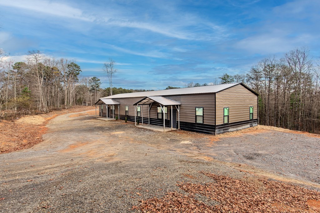 137 A Johnson Ford Road Epworth, GA 30541 - Photo 5 of 21 a house with a outdoor space
