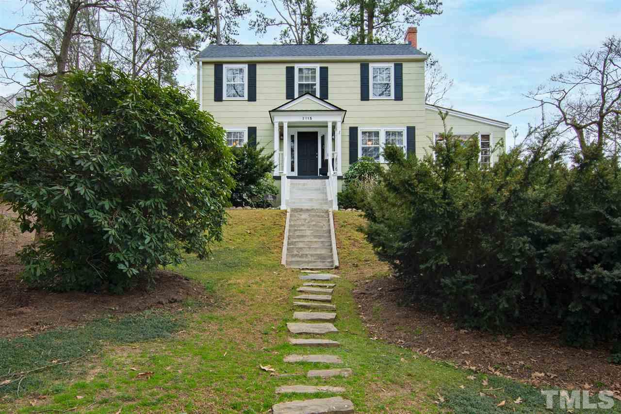 2115 Reaves Drive Raleigh, NC 27608 - Photo 1 of 26 a front view of a house with a yard