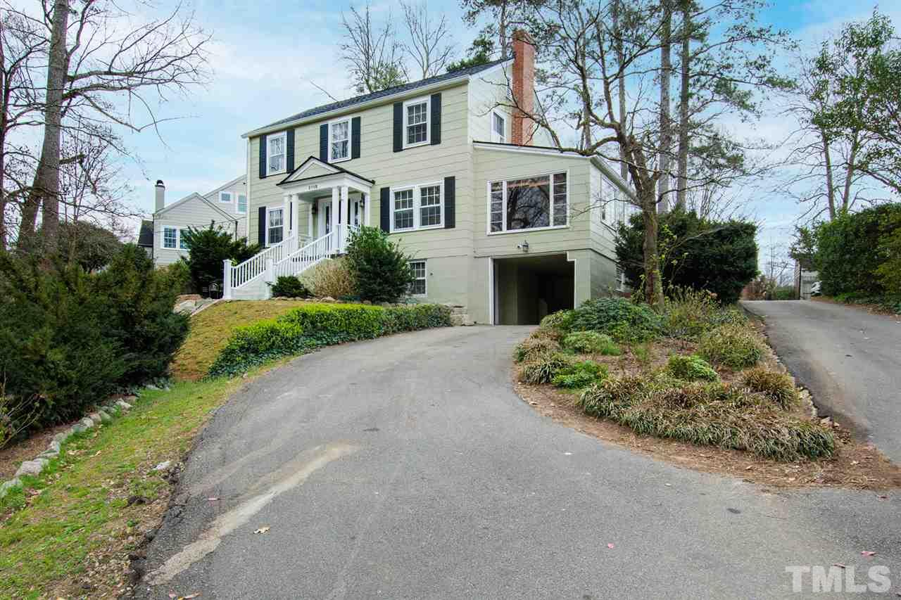 2115 Reaves Drive Raleigh, NC 27608 - Photo 3 of 26 a front view of a house with a garden