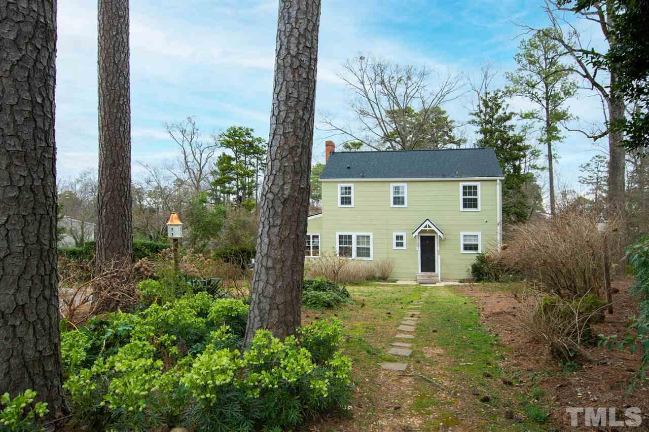 2115 Reaves Drive Raleigh, NC 27608 - Photo 24 of 26 a front view of a house with garden