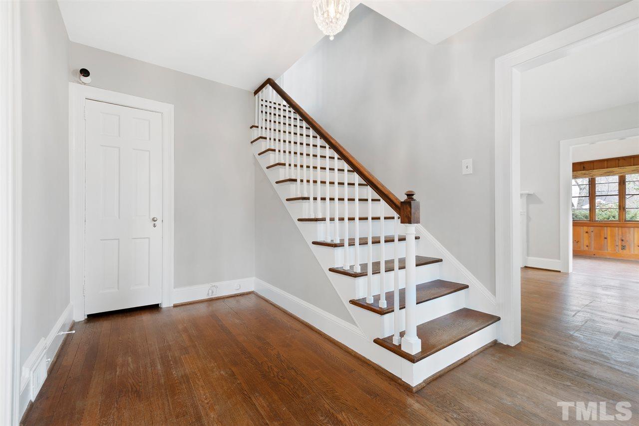 2115 Reaves Drive Raleigh, NC 27608 - Photo 4 of 26 a view of wooden floor in an empty room
