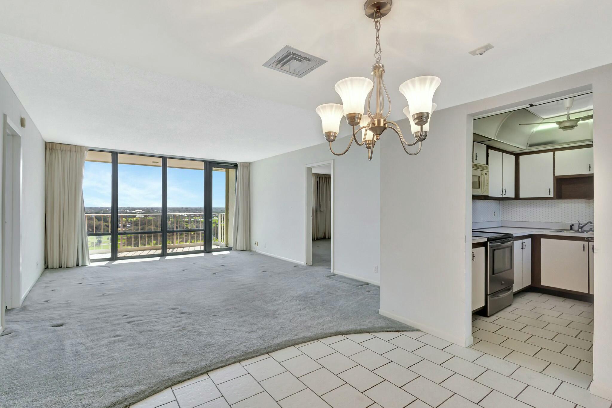 336 Golfview Road, Unit PH #15 North Palm Beach, FL 33408 - Photo 8 of 39 Living Room and Dining Area
