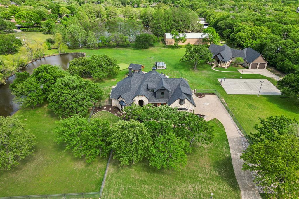1001 Cochran Road Argyle, TX 76226 - Photo 1 of 1 an aerial view of a house with outdoor space and garden