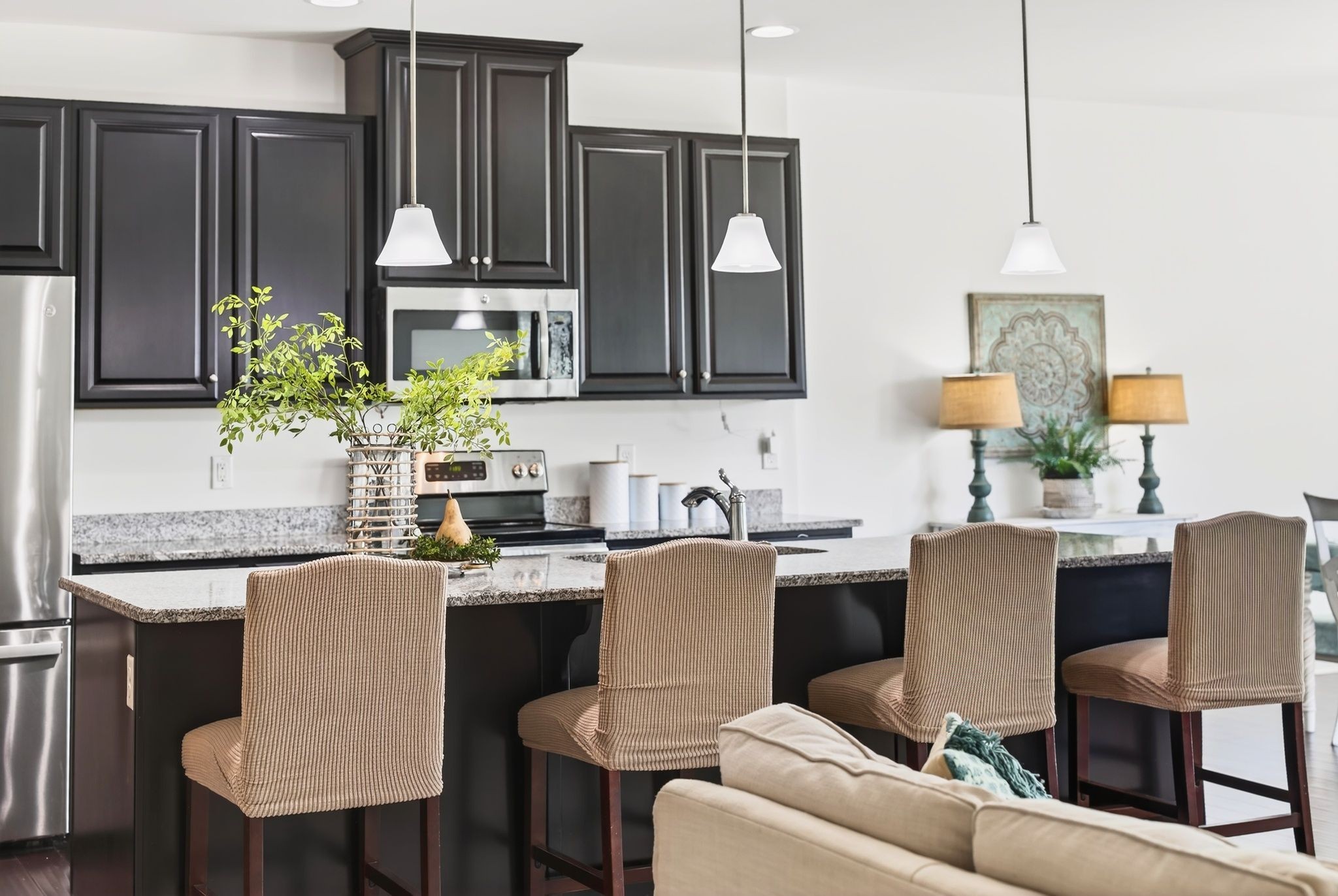 423 Heroit Drive Spring Hill, TN 37174 - Photo 16 of 43 a dining room with furniture a window and kitchen view