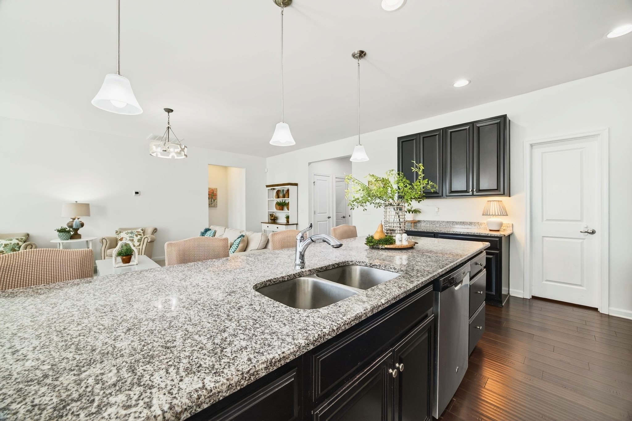 423 Heroit Drive Spring Hill, TN 37174 - Photo 23 of 43 a kitchen with granite countertop a sink a counter top space and cabinets