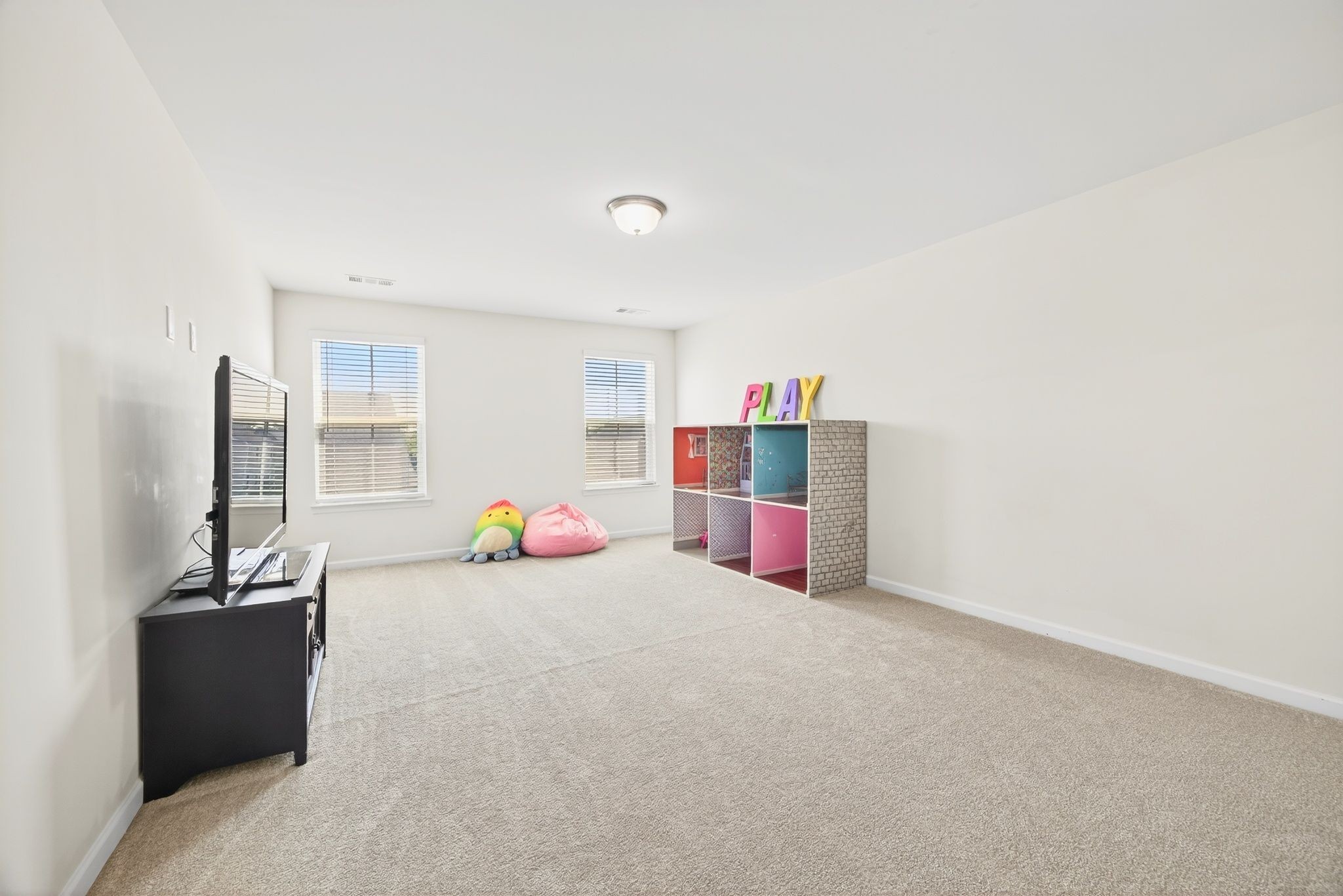 423 Heroit Drive Spring Hill, TN 37174 - Photo 38 of 43 a view of game room with toys