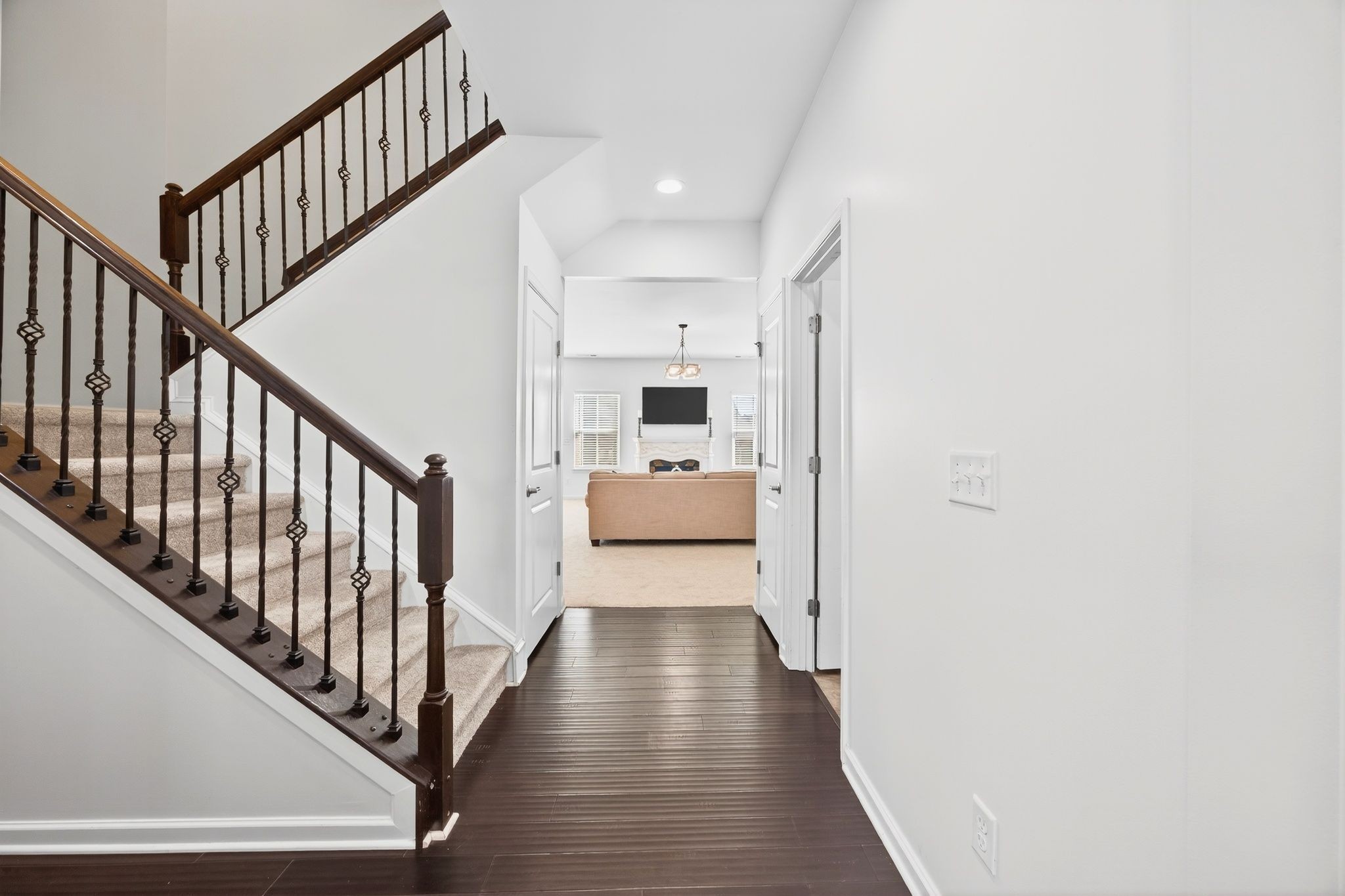 423 Heroit Drive Spring Hill, TN 37174 - Photo 7 of 43 a view of a hallway with the wooden floor and staircase