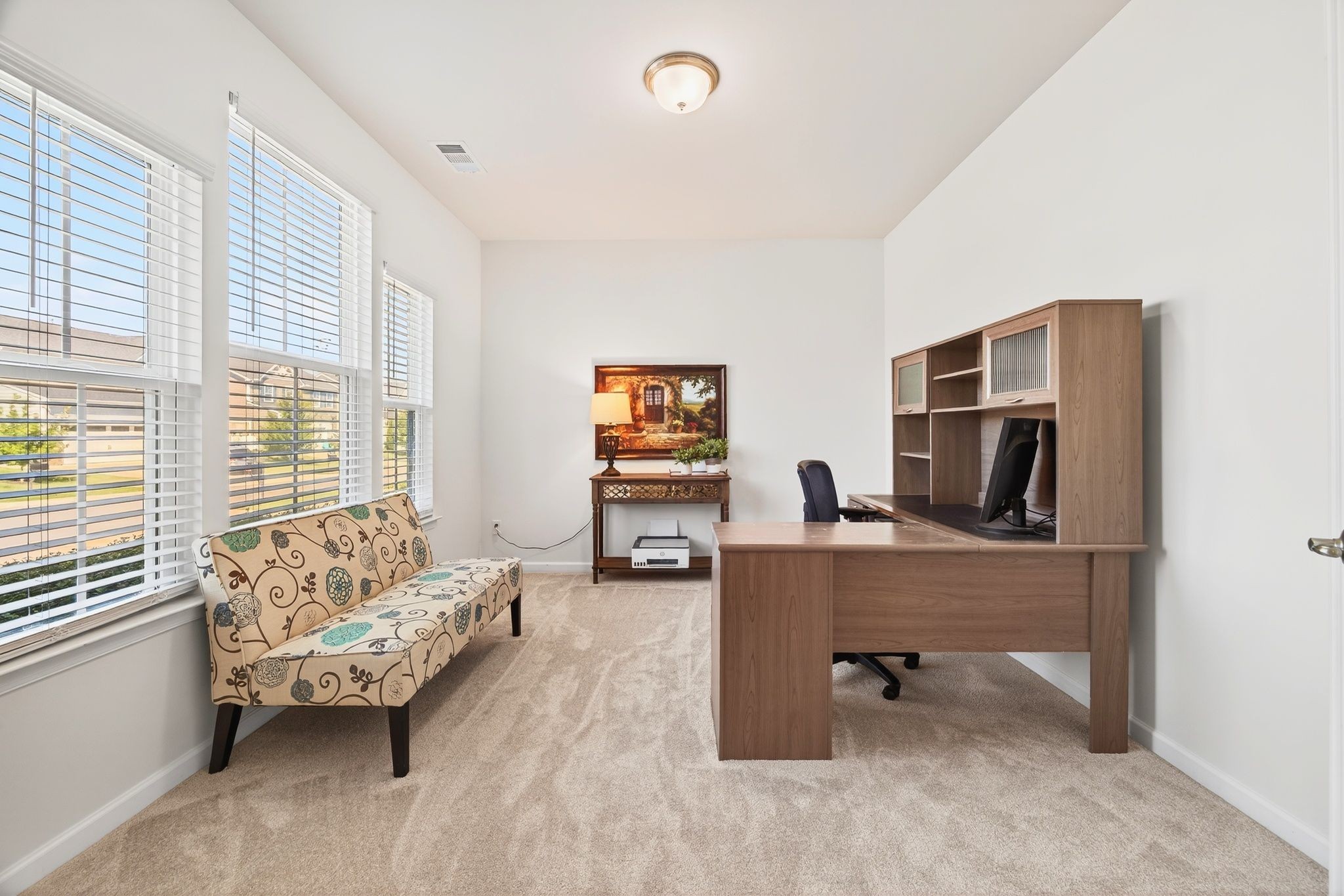 423 Heroit Drive Spring Hill, TN 37174 - Photo 9 of 43 a workspace with furniture and a window