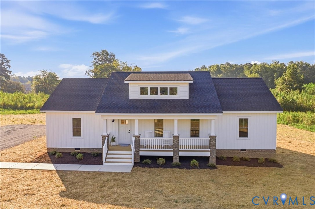 15203 Cox Road Church Road, VA 23833 - Photo 2 of 32 White board-and-batten siding with a dark shingle
