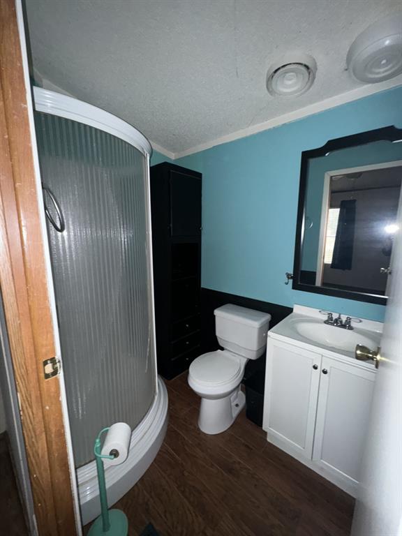 9949 Green Tree Lane Wills Point, TX 75169 - Photo 7 of 9 a bathroom with a toilet sink and mirror
