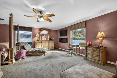 a view of a livingroom with furniture and windows