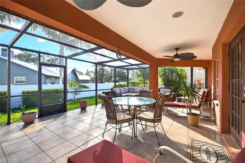 a view of yard with patio