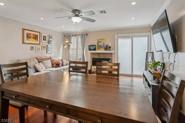 a view of kitchen and dining room with wooden floor