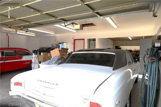 a living room with lots of furniture and a flat screen tv