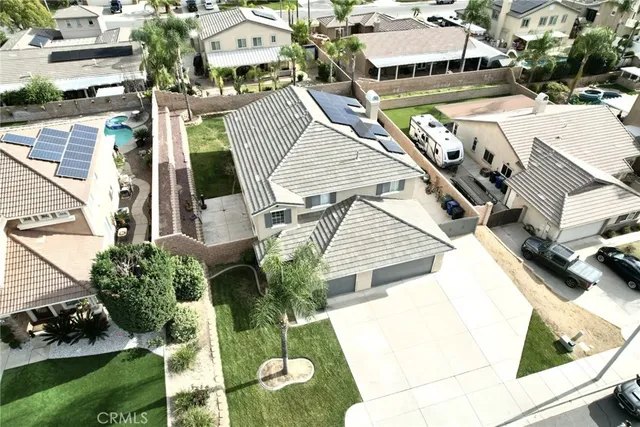 a view of living room with furniture and a fireplace