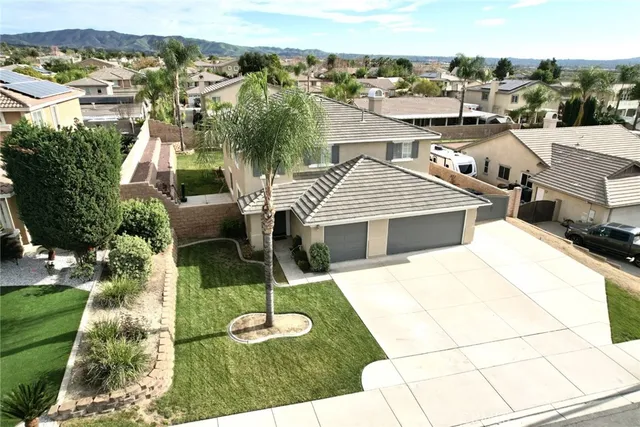 a terrace with outdoor seating and city view