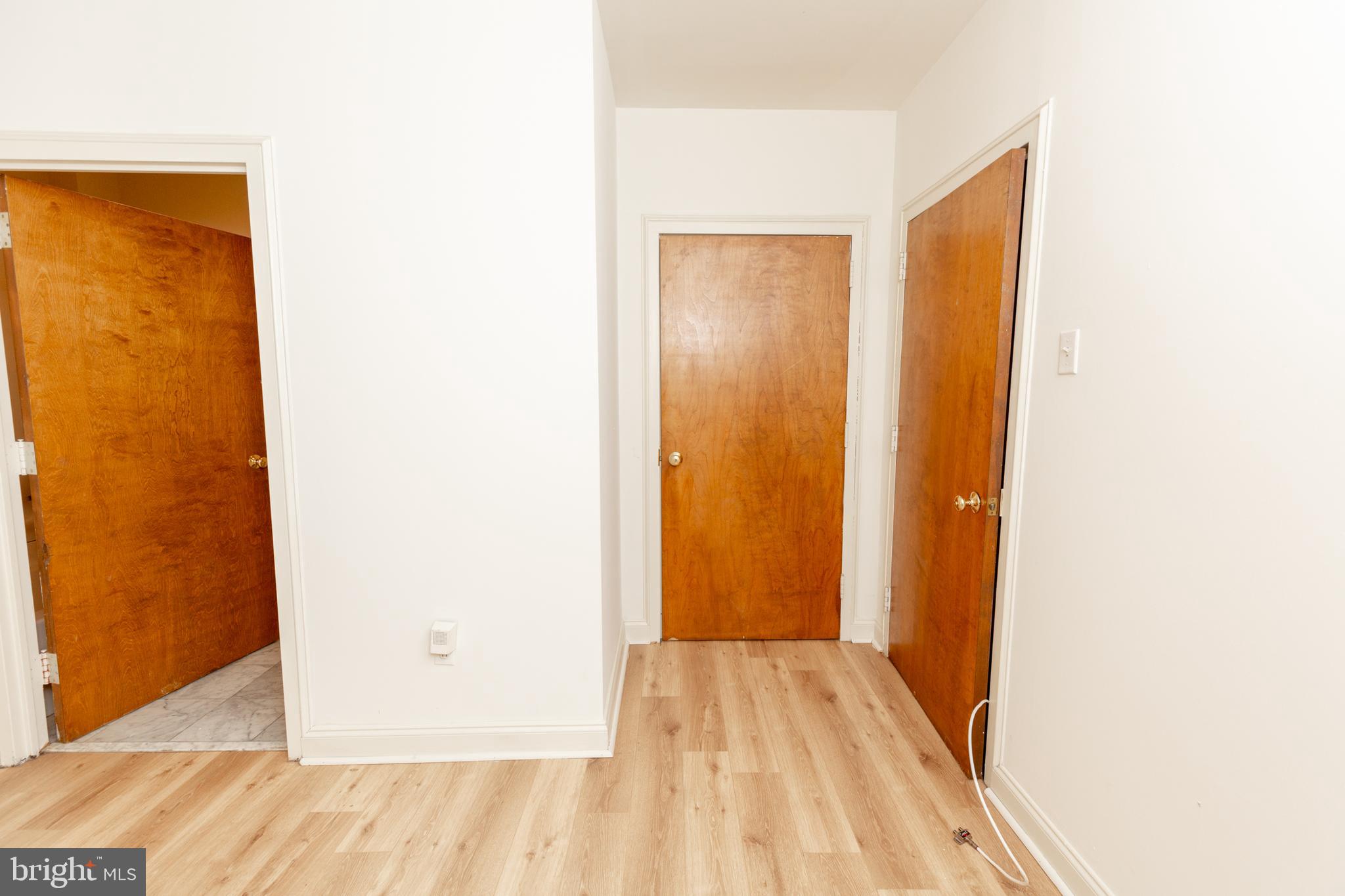 1411-5 Walnut Street, Unit 906 Philadelphia, PA 19102 - Photo 14 of 20 a view of a room with wooden floor