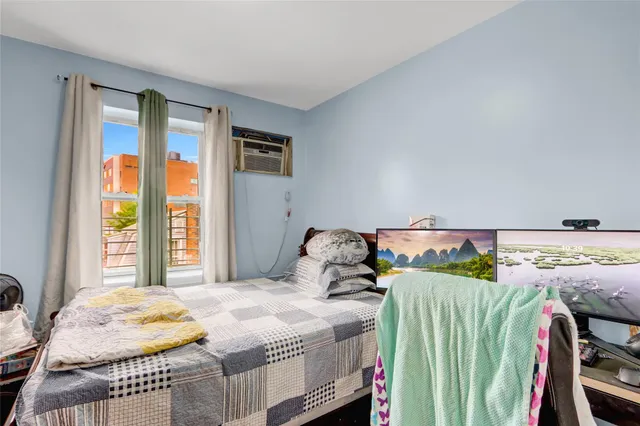 a bathroom with a sink toilet and a mirror