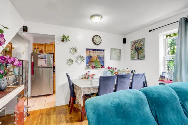 a bedroom with a bed and a chair