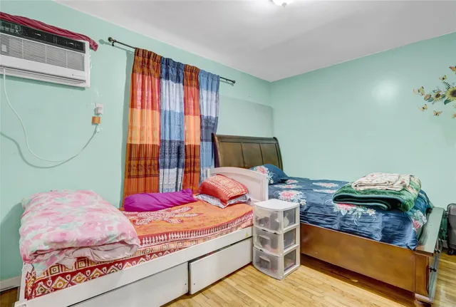 a view of hallway with wooden floor